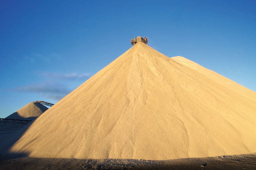 Enormous sand-colored pyramids of material