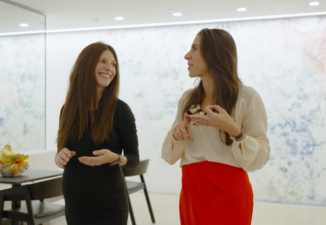 Two women talking
