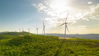 wind turbines in a mountain range