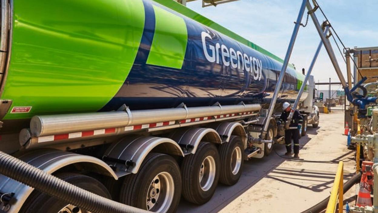 A "Greenergy" truck being filled with sustainable used cooking oil fuel.