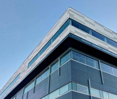 Up view of modern building against blue sky