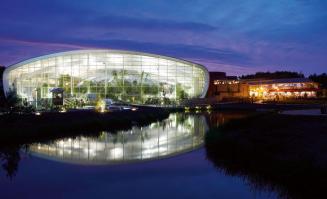 Night view of lake and holiday park meeting center