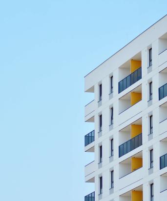 Apartment building against blue sky