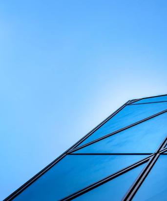 Upview of building against blue sky