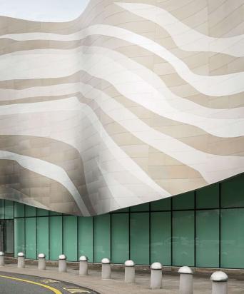 Modern building with wavy exterior patterns